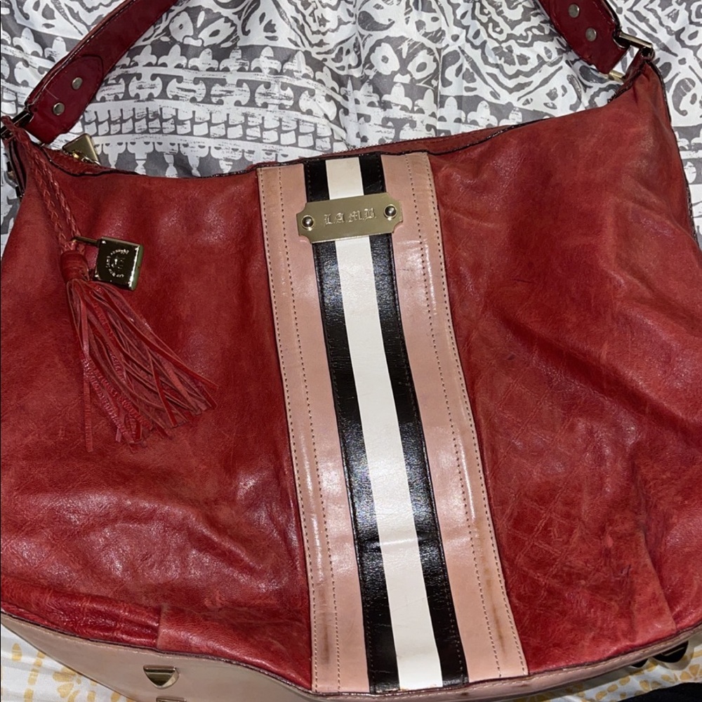 Gently used L.A.M.B bag🥰 shoulder ( Classic styles it’s details.